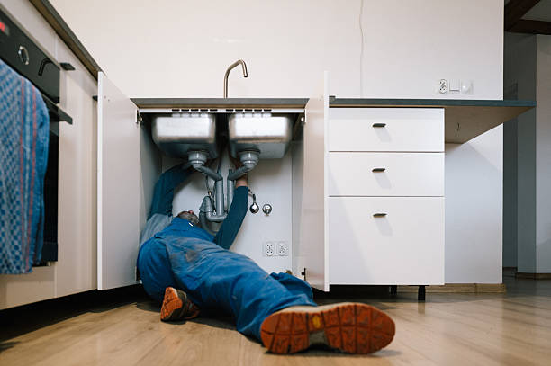 Professional Plumbing technician working in Townsend, DE
